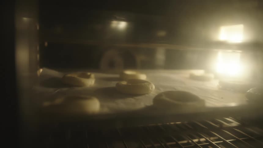 Donuts baking in an oven