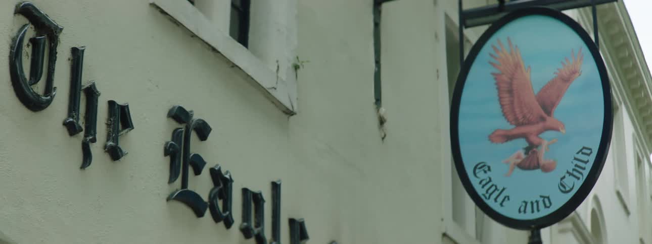 Pub in england known as the eagle and child with an exterior sign