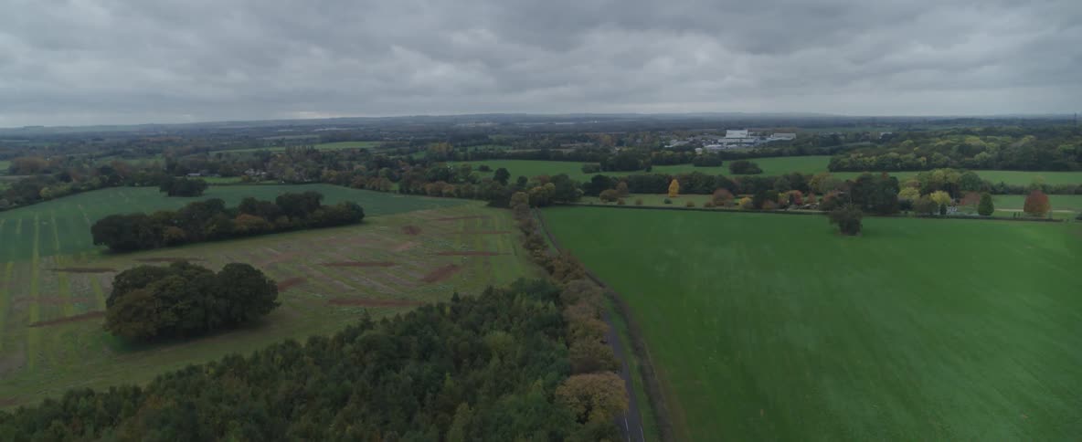 Heavy clouds are over the green landscape