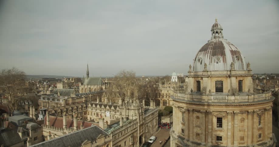 Panorama of an urban city with the radcliffe camera dome on a cloudy day