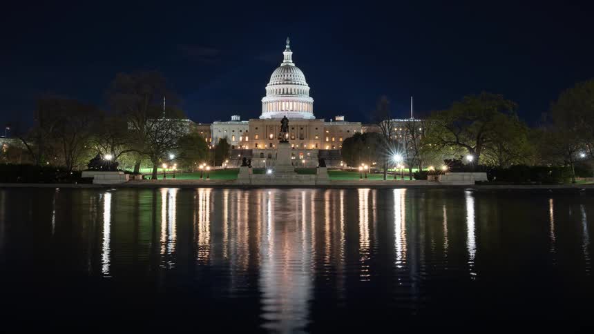 Time lapse of the us capitol building lit up at night