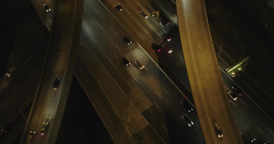 An aerial view of a busy freeway at night
