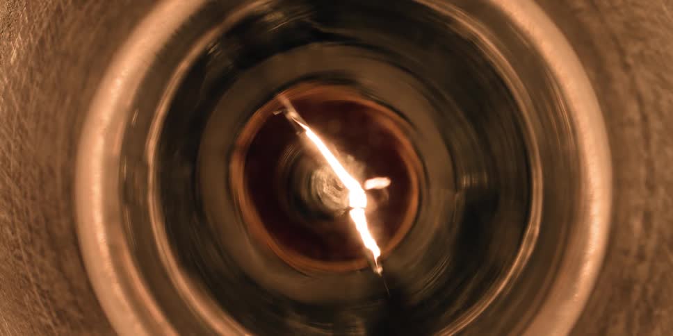 A filament on a light burns brightly