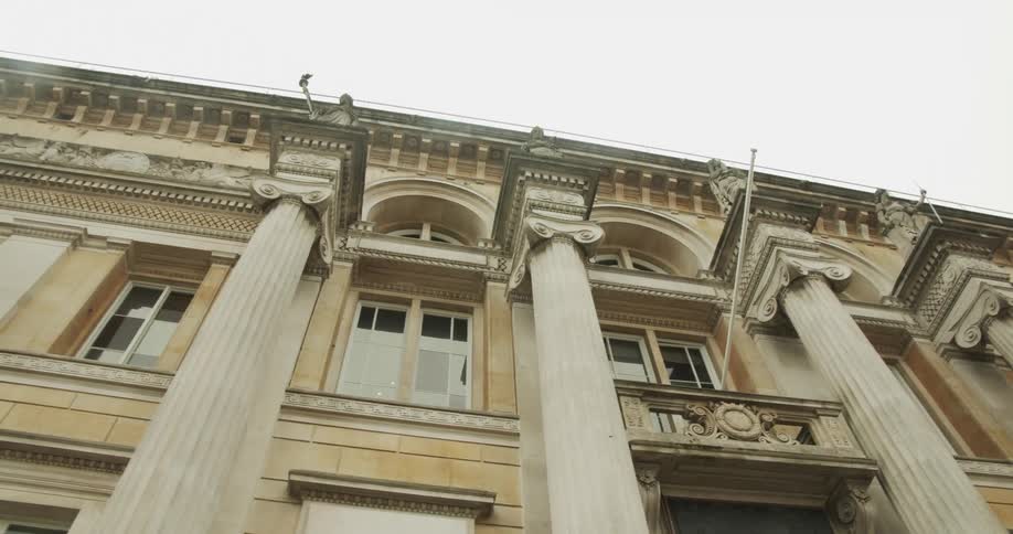 A tall building with columns and arches