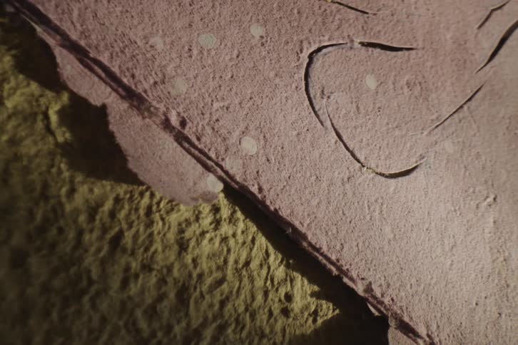 Design marks in a piece of pavement