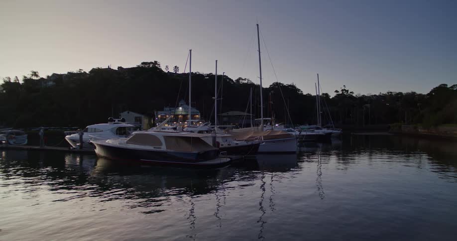 Boats float while sitting in a marina