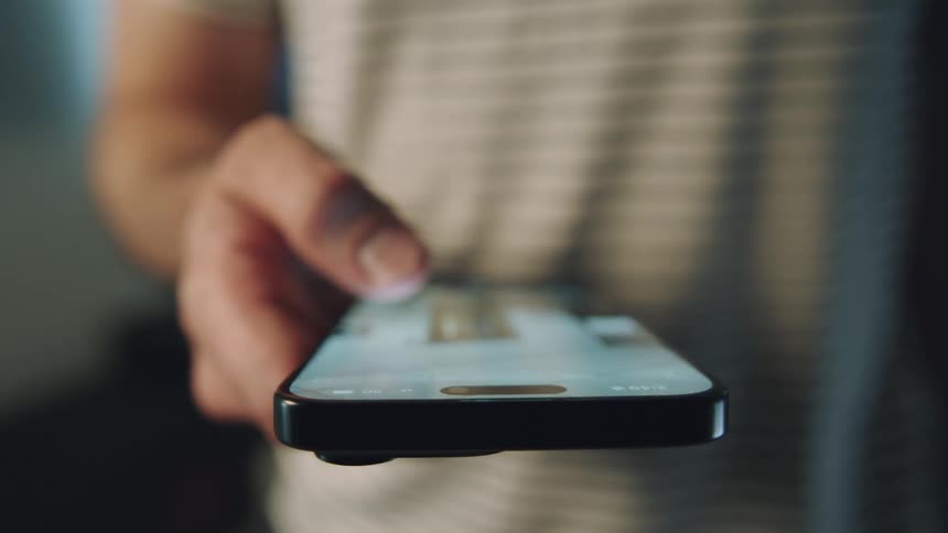 A clip of a person operating a smart phone