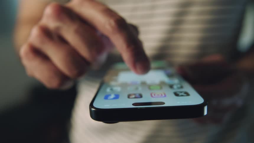 A clip of a person scrolling through a smartphone