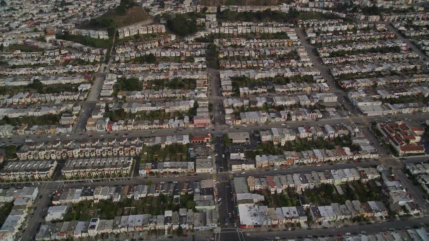 Aerial panorama of an urban city with intersections in vehicular traffic during the day
