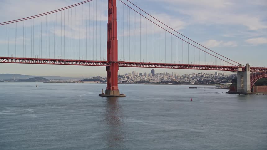A large bridge is by the city
