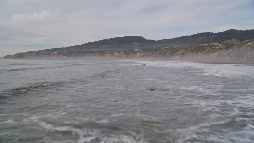 The water is rough near the shore