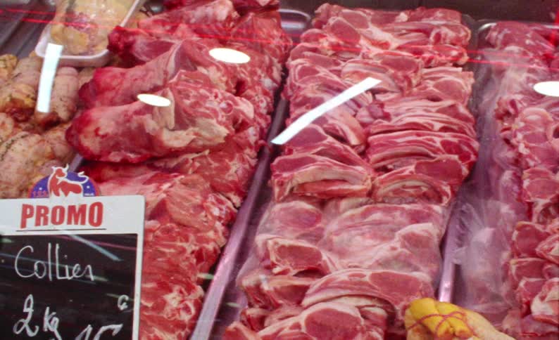 Gland with fresh meat for sale in a butcher shop