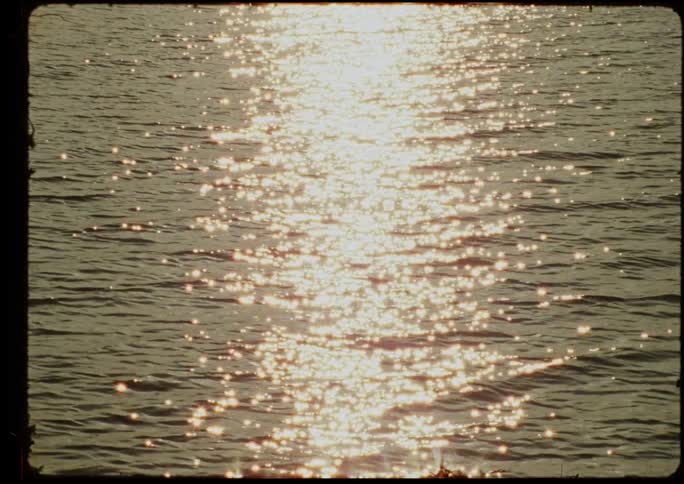 Reflection of sunlight in the middle of a calm sea