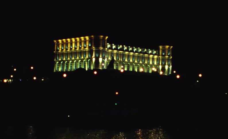 The building is lit up at night