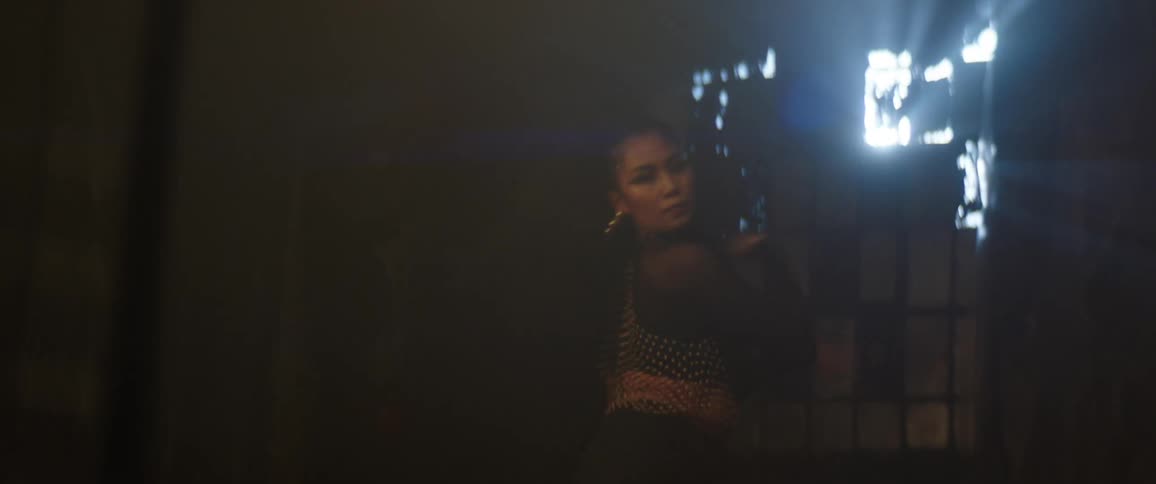 Two women dancing a choreography together in a studio