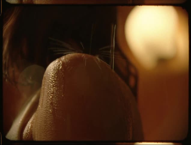 A womans shoulder getting wet from rain