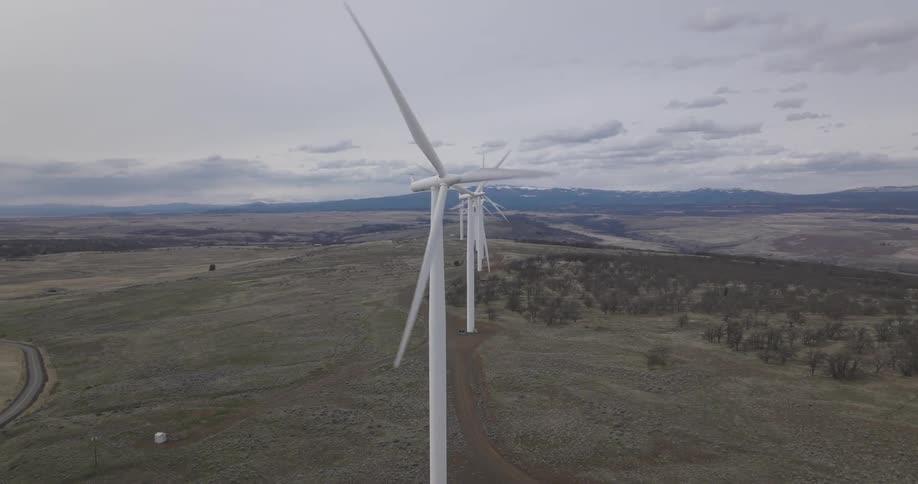 Windmills spin on a wind farm