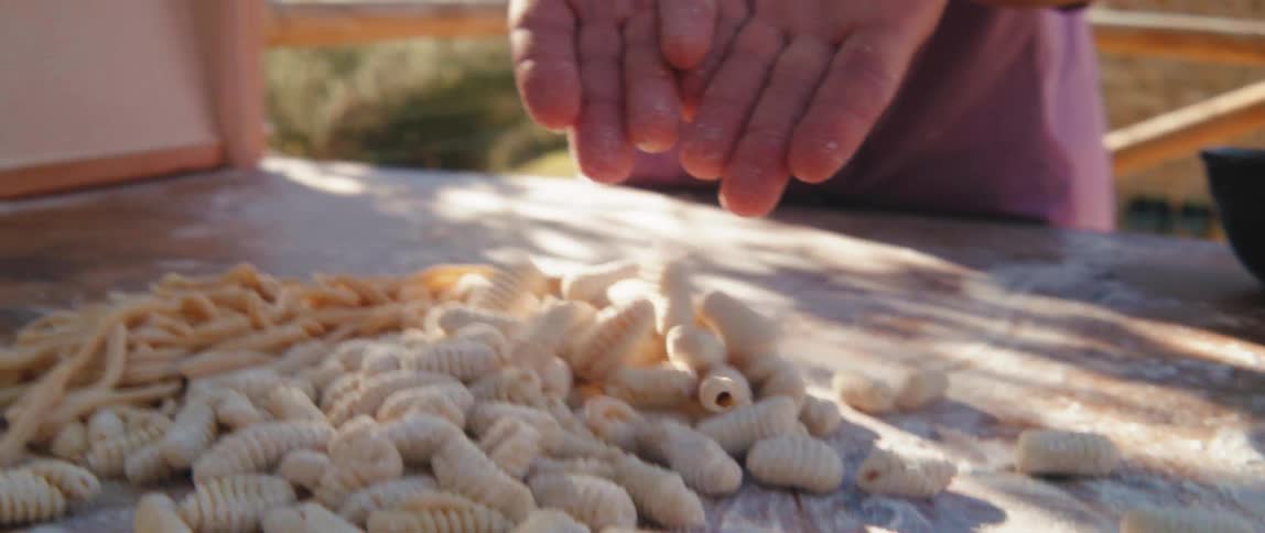 A chef makes handmade pasta