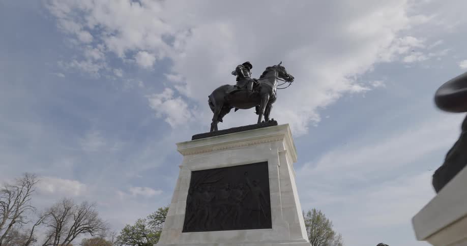 A monument with a man on a horse
