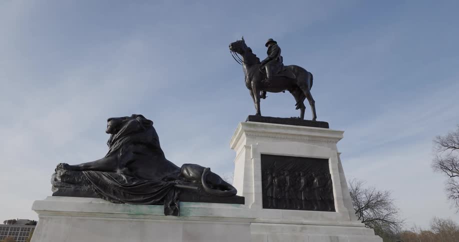 Statues of a lion and a man on a horse