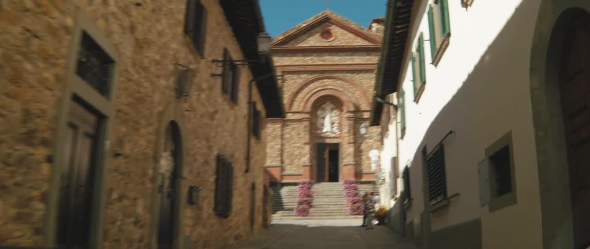 Driving towards the church santa maria castello in panzano