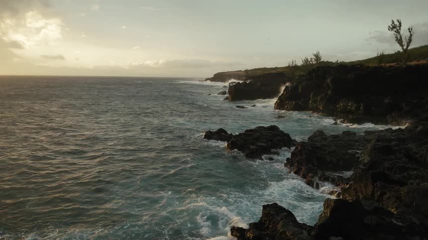 Waves crash against a rocky coast