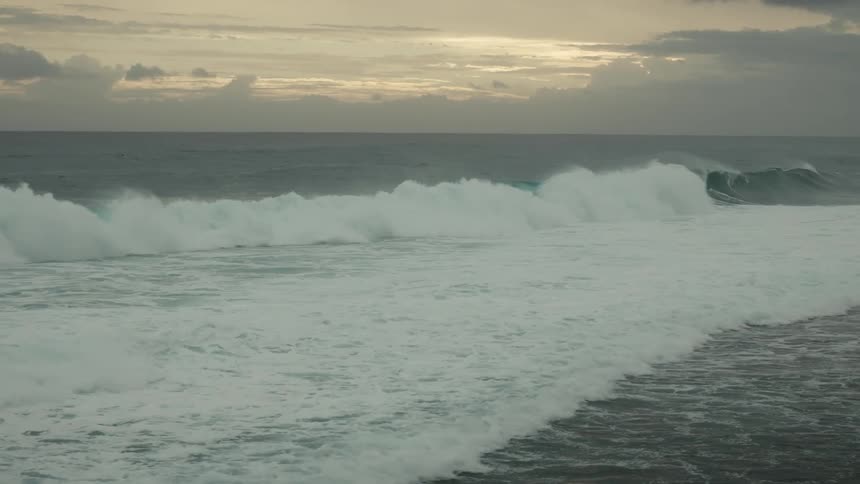 Waves wash ashore on a coast
