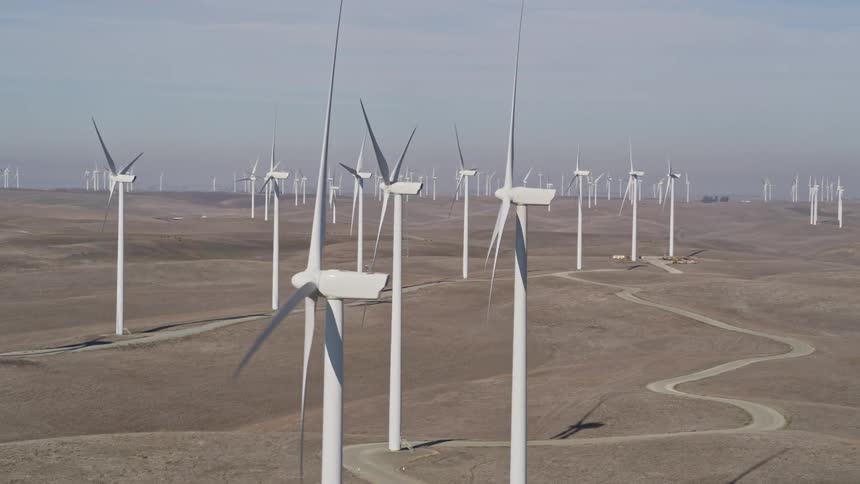 A clip of wind turbines in a desert
