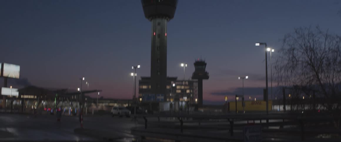 Airport control tower at dusk