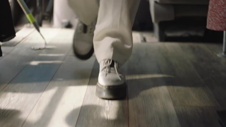 A person walks to try new shoes