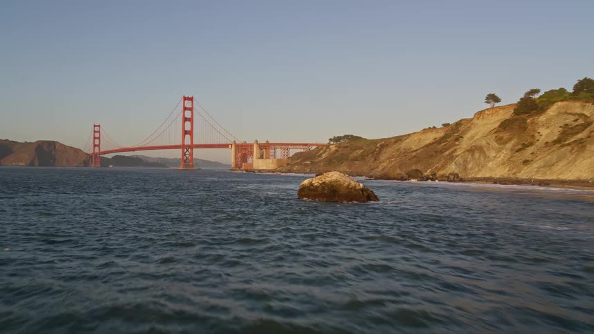 A large bridge is on the river