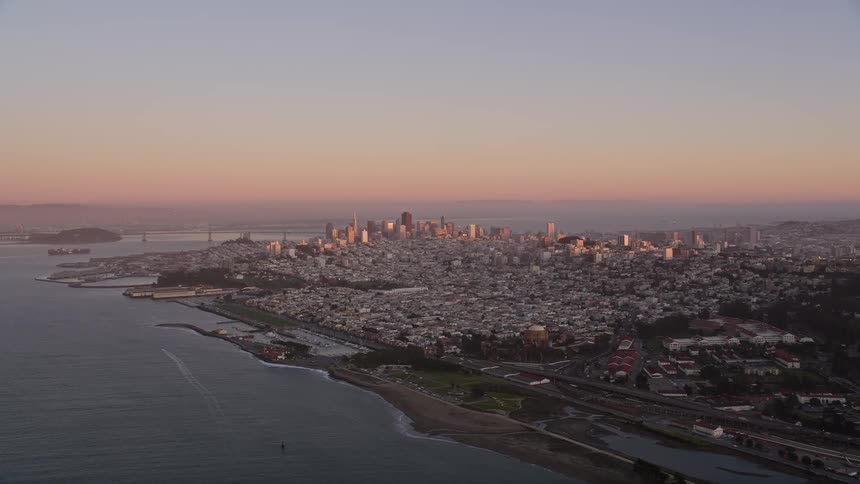 A city sprawls on a coast