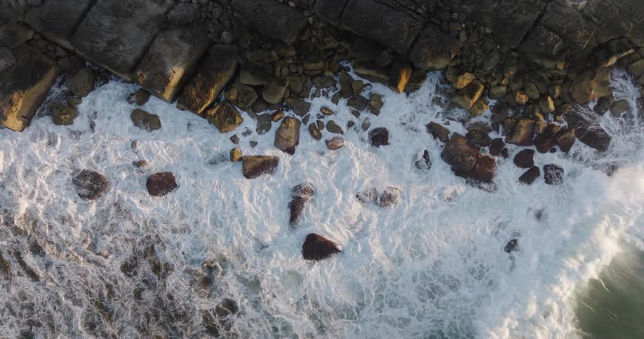 Strong waves pound a rocky coast