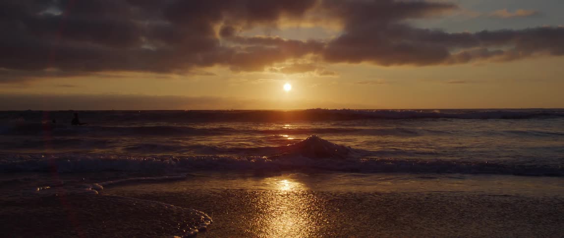 Waves crash into a shore