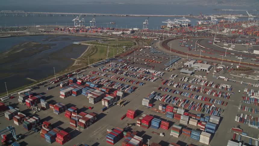 Aerial view of a large area of freight containers near a harbor