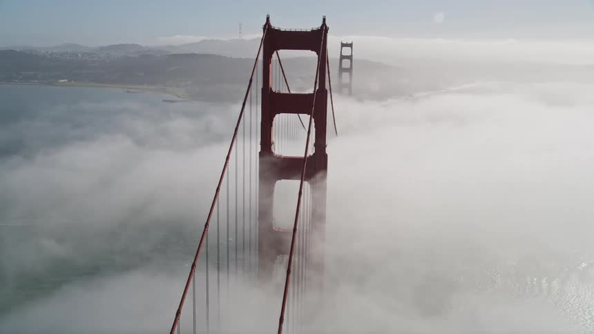 Fog covers the large bridge