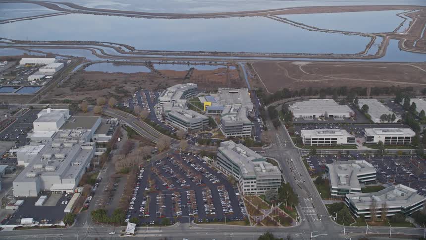 The parking lot is full next to the factory