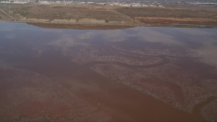 An aerial clip of a lake in the desert