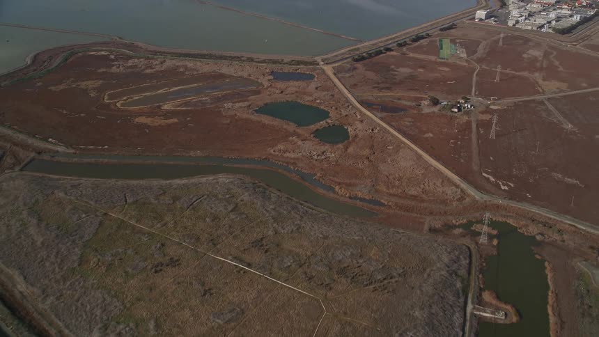 An aerial clip of a community close to the lake