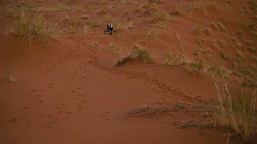 A clip of a cycler in the desert