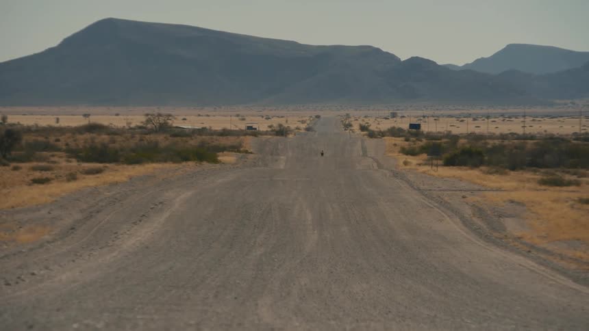 A footage of a road in a desert