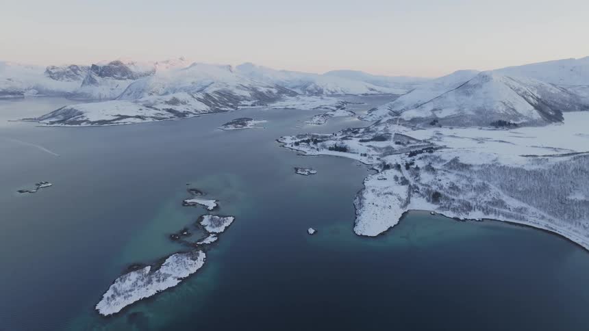 Aerial panorama of a peninsula with covered islands in a morning