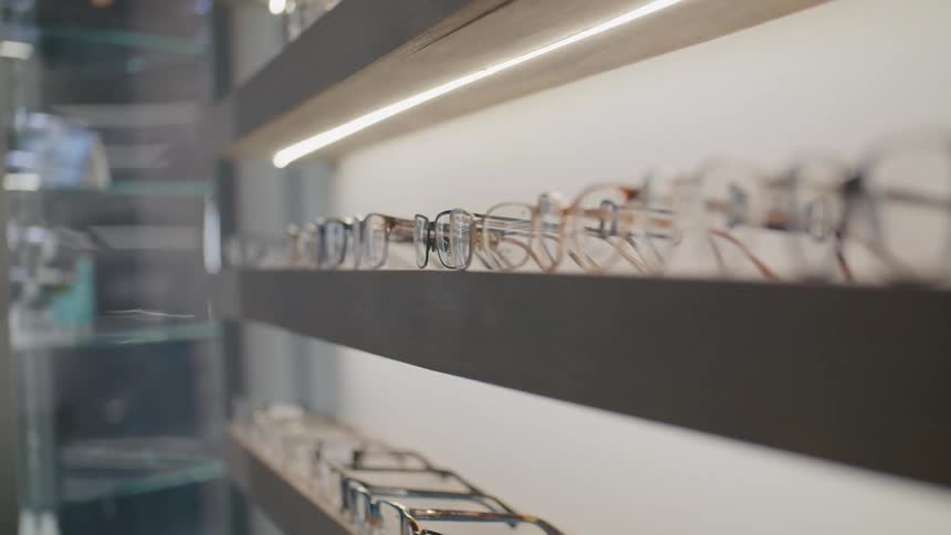 Shelf with prescription glasses on display in a store