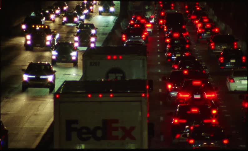 Panorama of a highway in two different directions with vehicle traffic at night