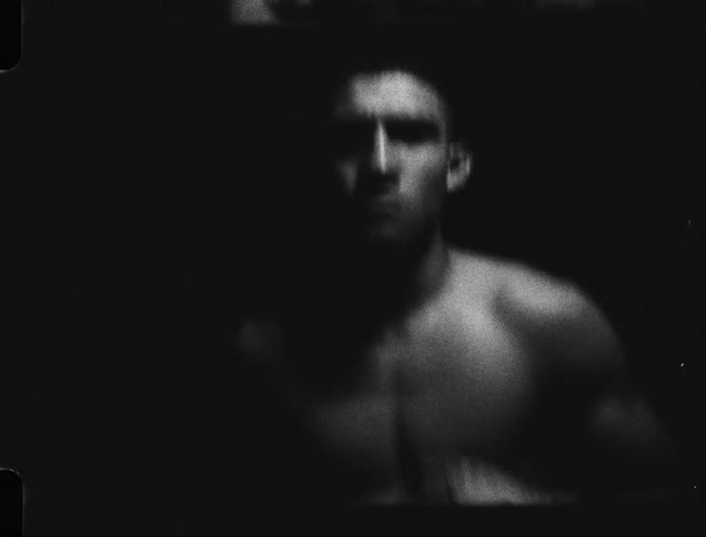 A man is jogging in the dark