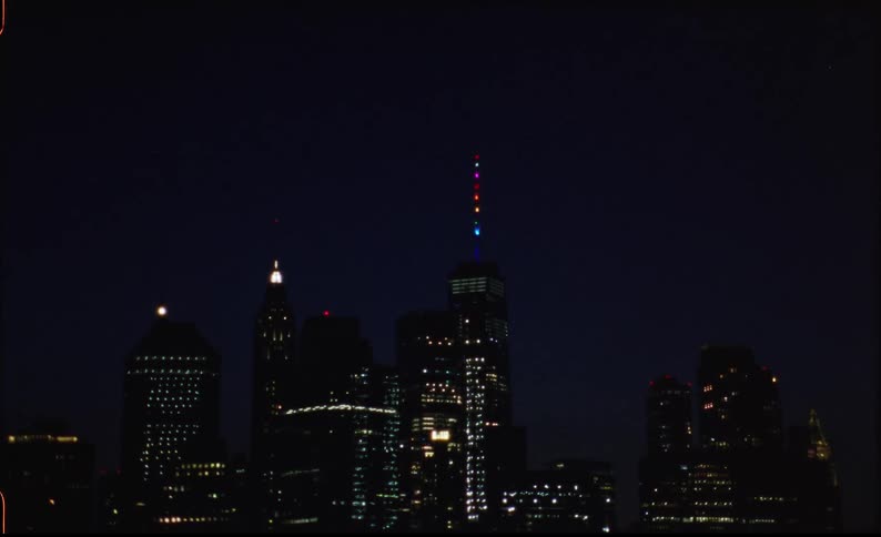 Sky flashes brightly over downtown skyscrapers