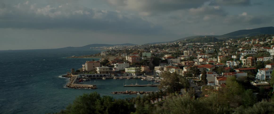 Clouds float over a coastal city