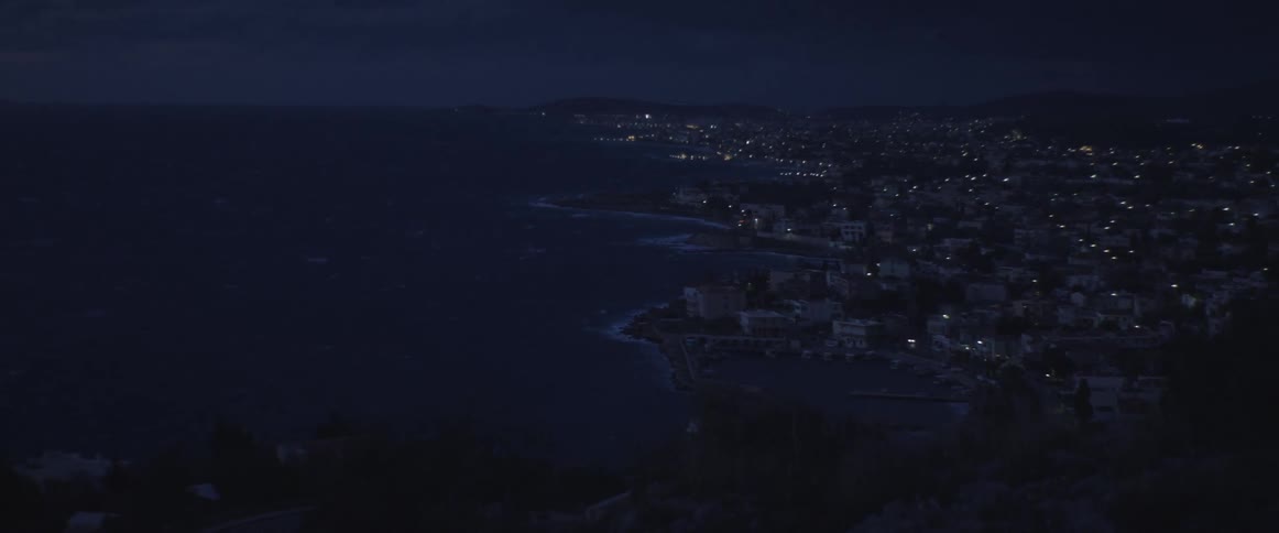 Ocean side city at night