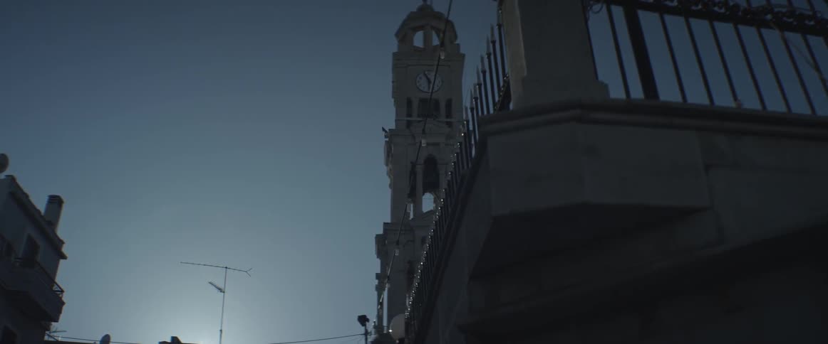 A tower stands tall over a city