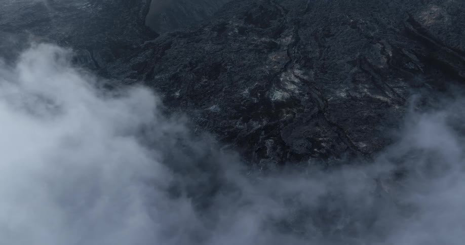 Clouds hover over the earth